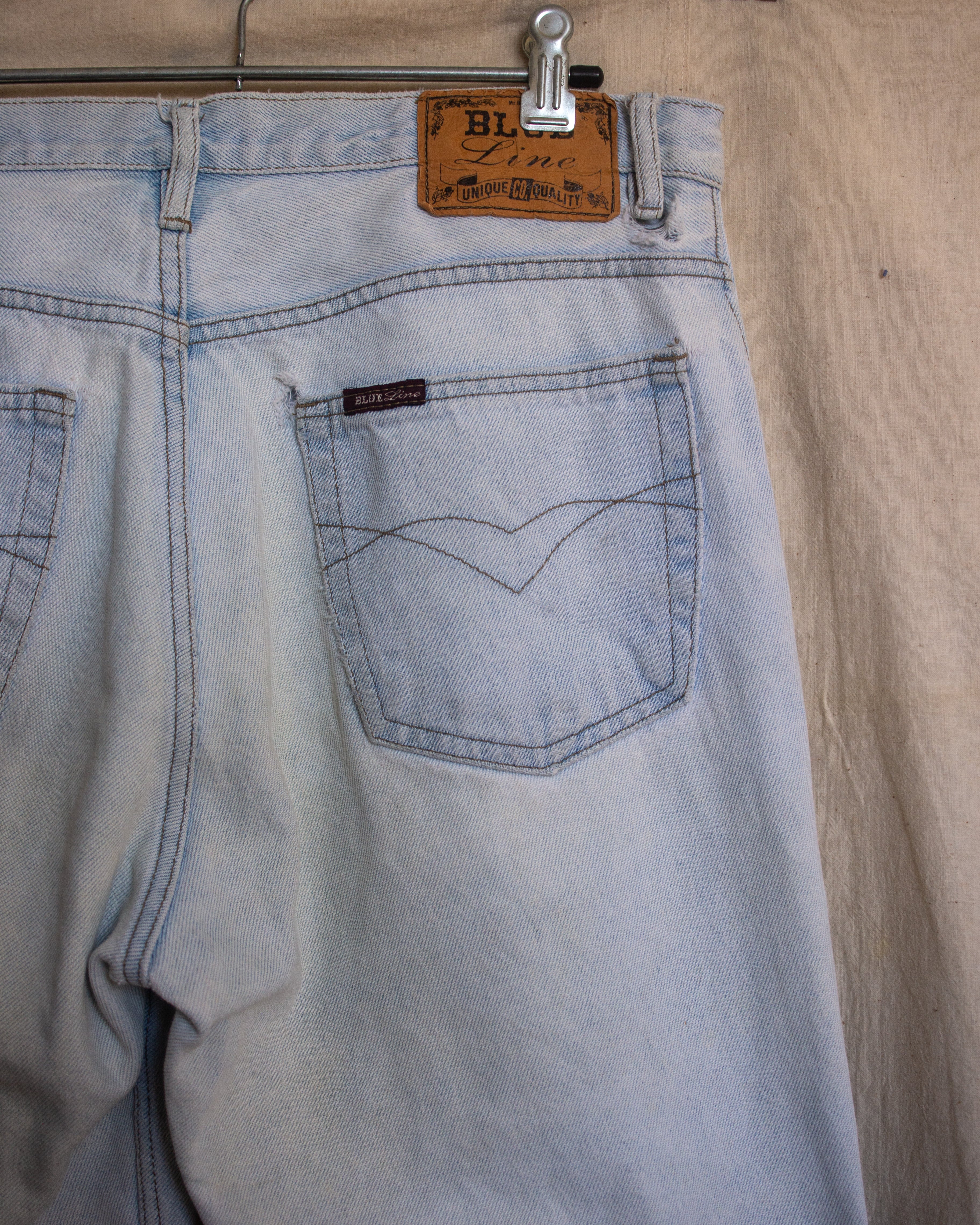 90S thrashed and drawn on jeans